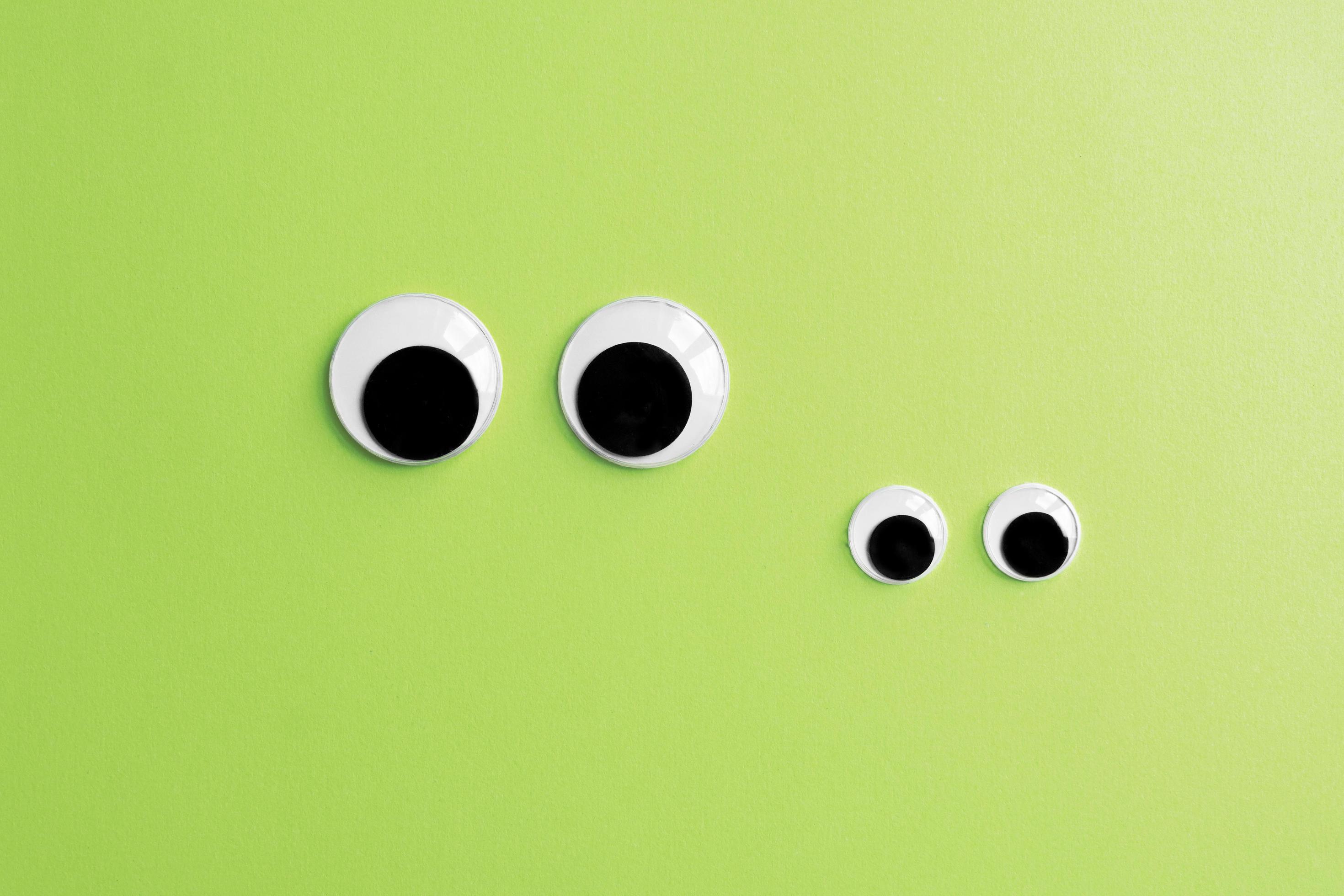 invisible frog googly eyes on green color background 12825110 Stock
