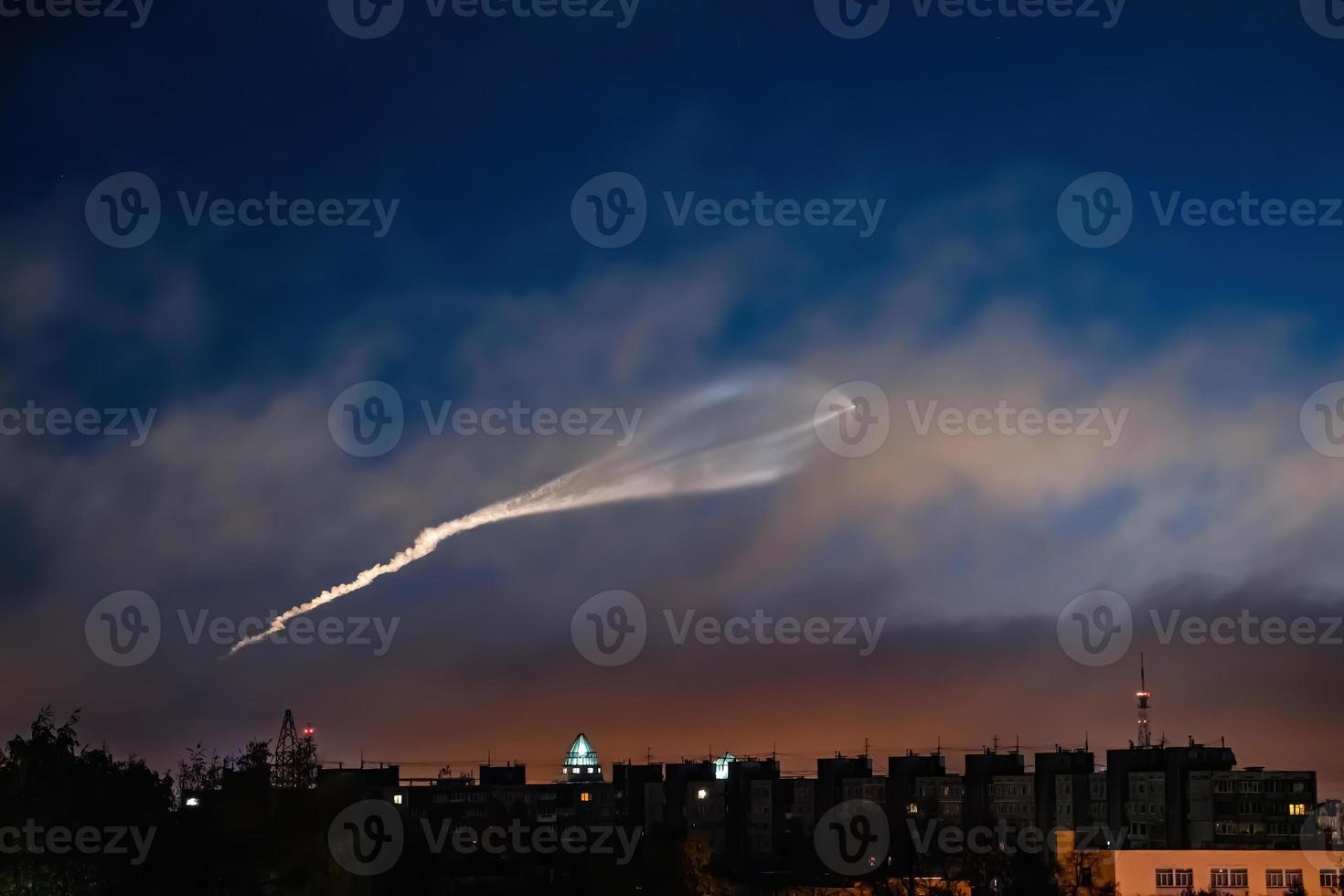 Soyuz space rocket launch. Space jellyfish in sky. Plume of rocket gases in sun at dawn. photo