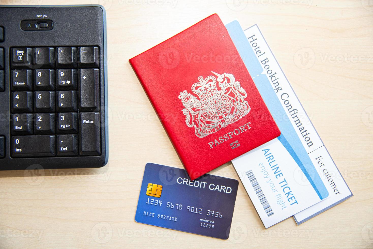Travel concept, Travellers accessories for travelling around the world on summer vacation or long holiday such as passport, airline ticket, hotel booking confirmation and credit card photo