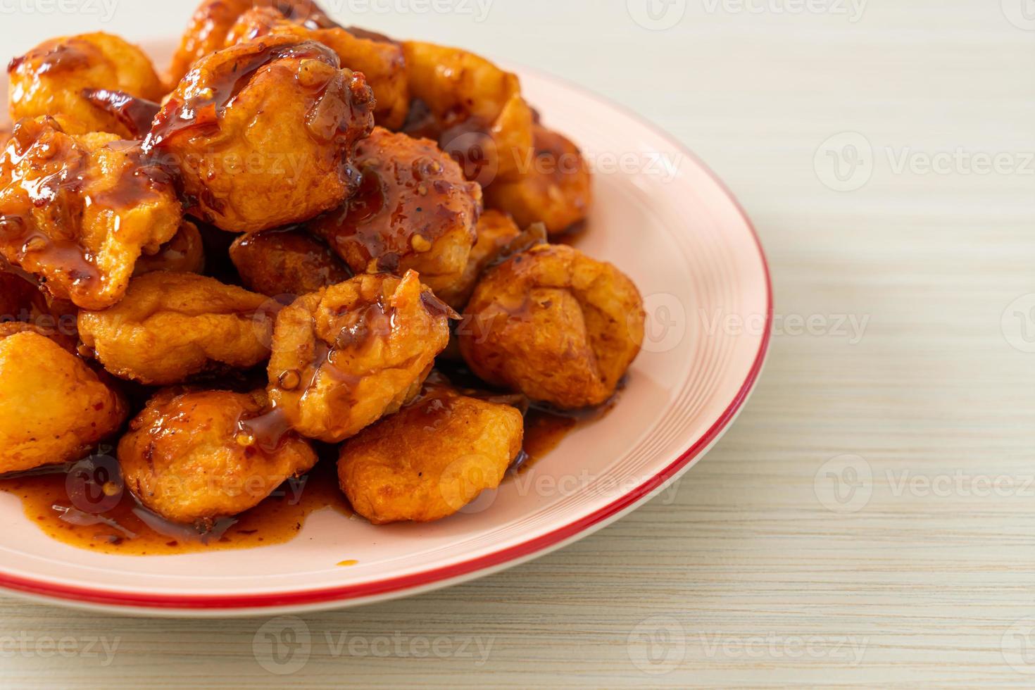 fried meatballs with spicy dipping sauce photo