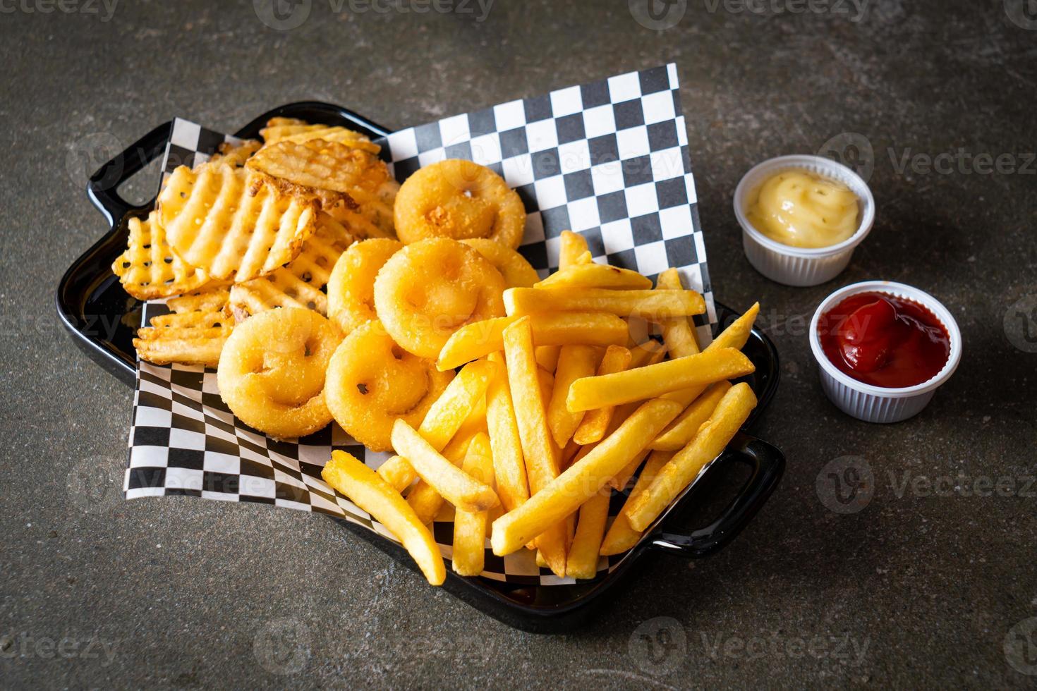 mix fries - French fries with hash browns and waffle fries photo