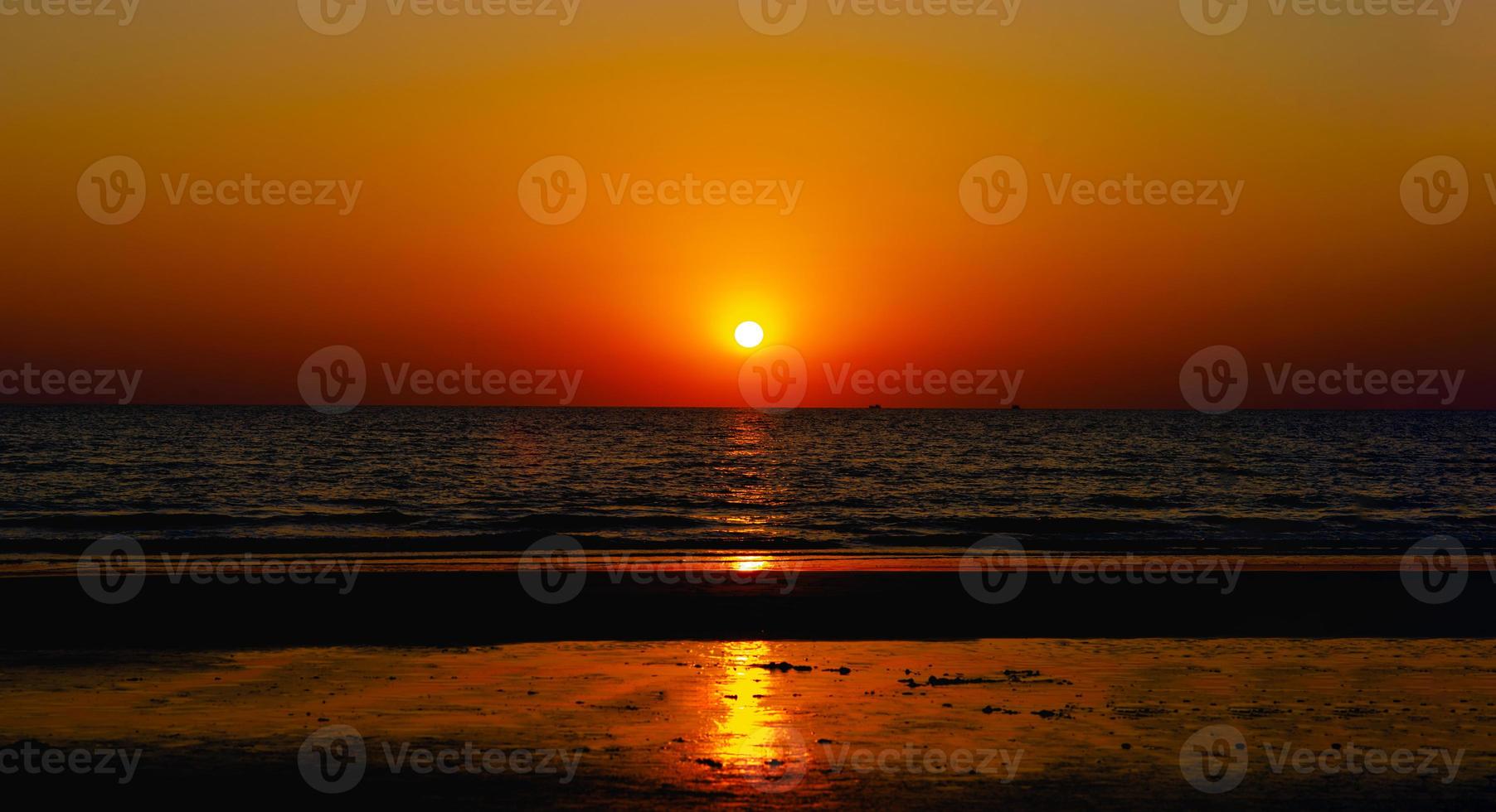 The sun and the sea, the colors of the sun at hand A time of peace and beauty at sea concept of nautical landscape with free space photo