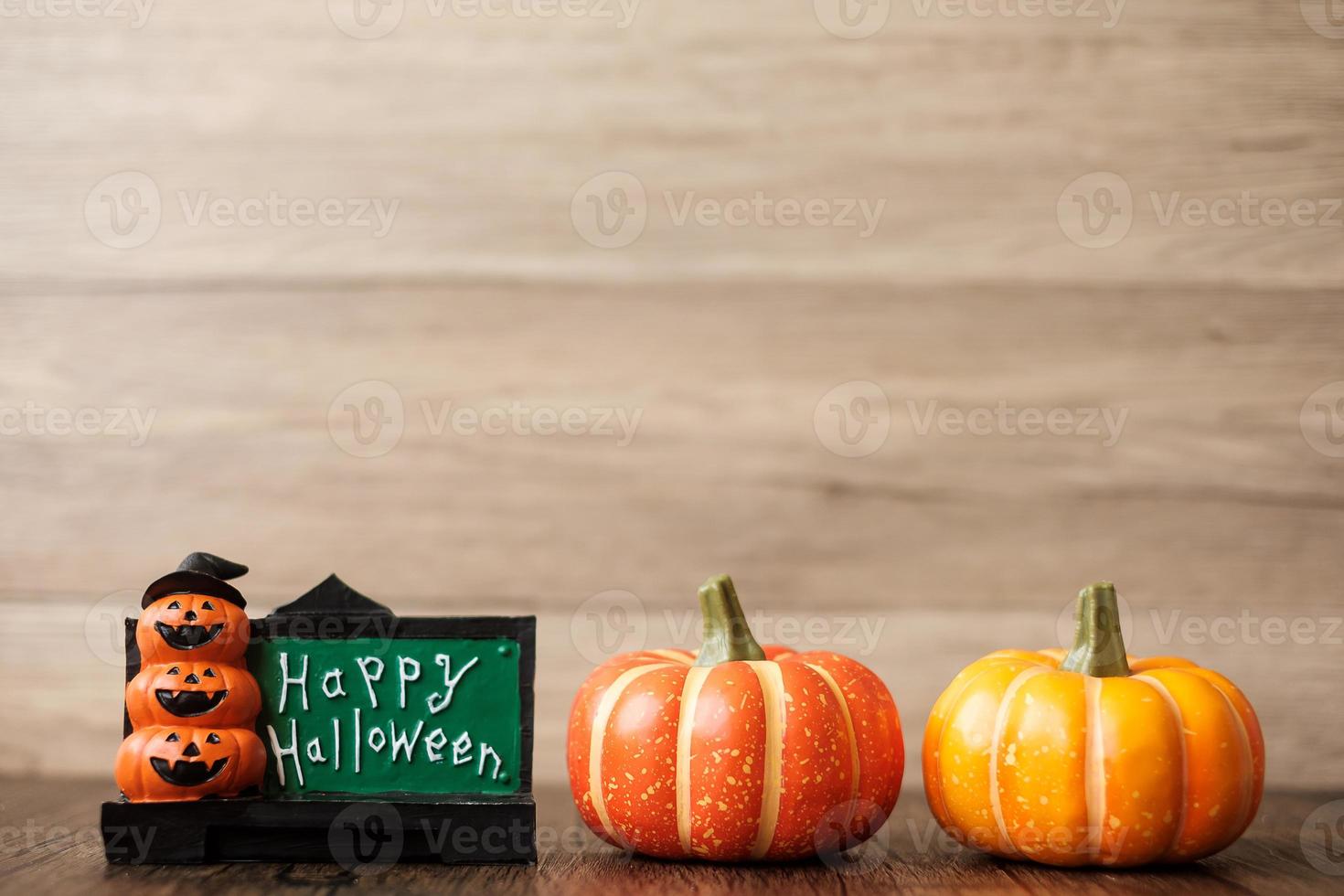 Orange pumpkin on table with copy space for banner background. Happy Halloween day, Hello October, fall autumn season, Festive, party and holiday concept photo