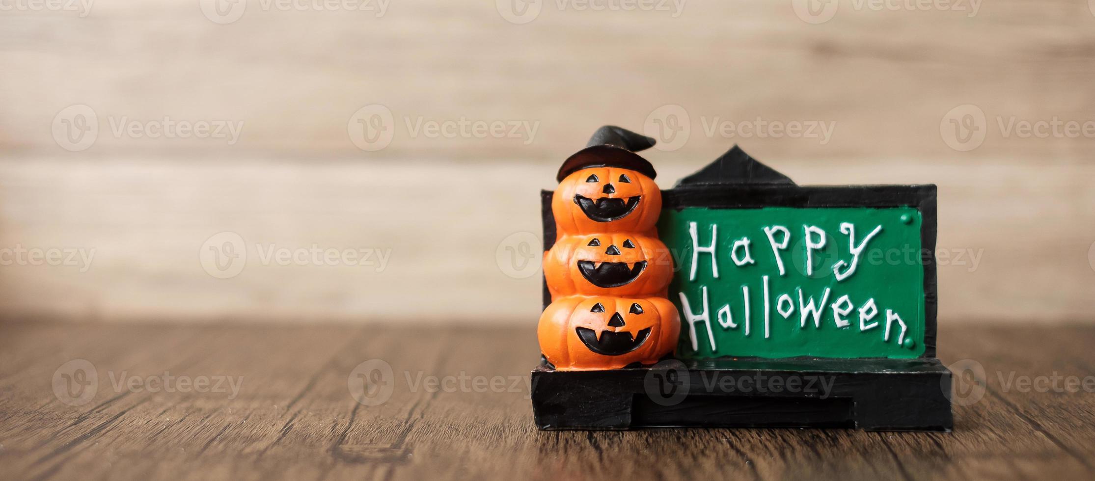 Orange pumpkin on table with copy space for banner background. Happy Halloween day, Hello October, fall autumn season, Festive, party and holiday concept photo