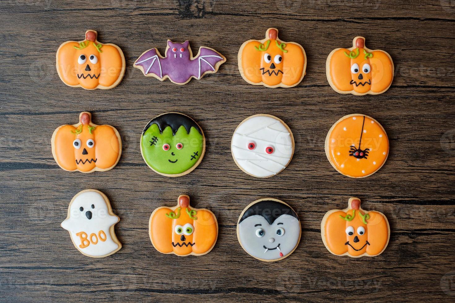 Happy Halloween day with funny Cookies set on wooden table background. Trick or Threat, Hello October, fall autumn, Festive, party and holiday concept photo