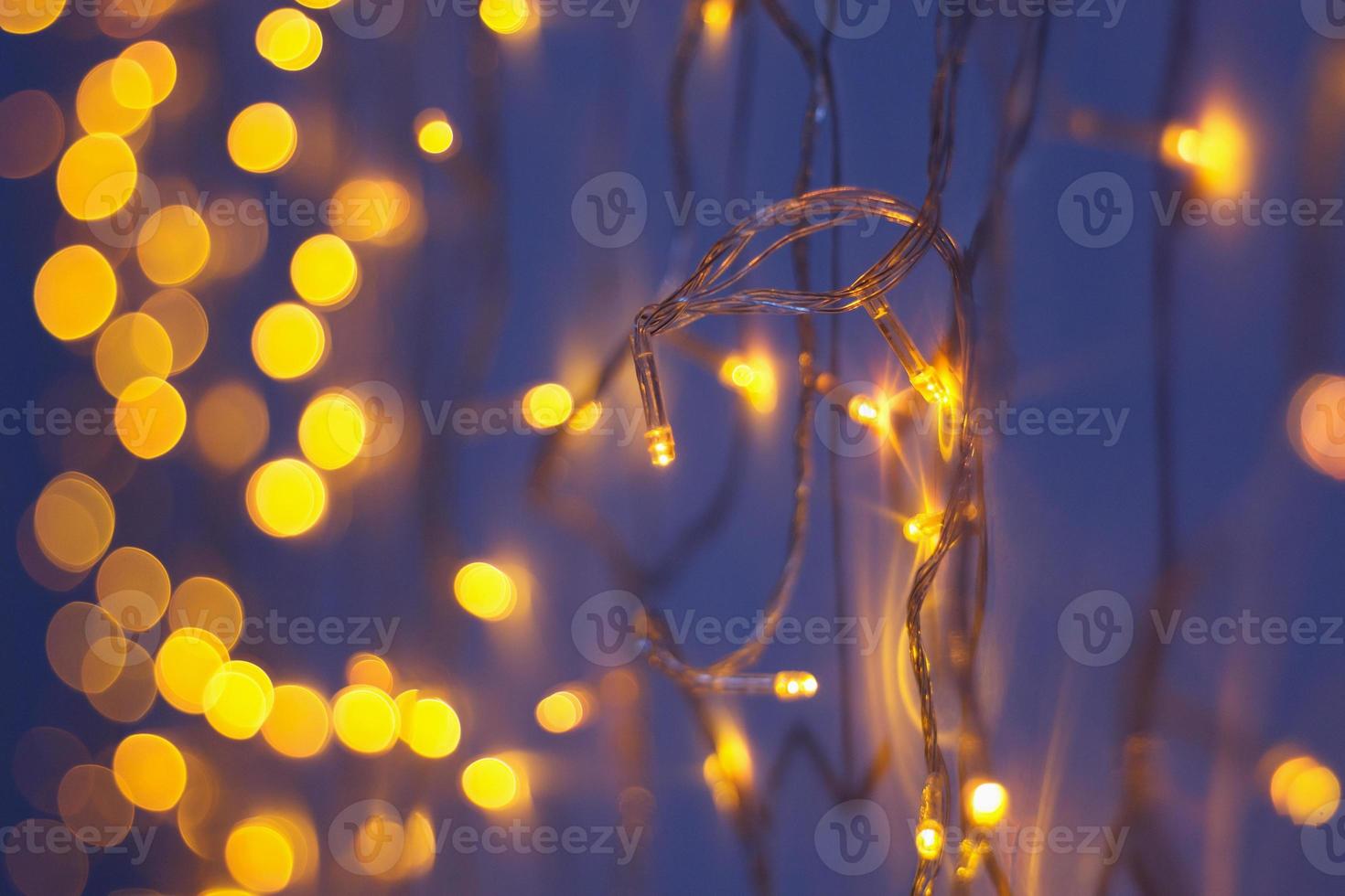 Abstract golden bokeh light Christmas holiday background photo