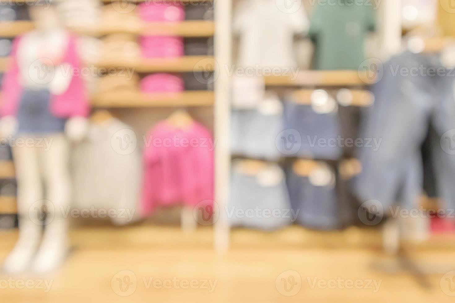 modern clothing store interior blur abstract defocused background with bokeh light photo