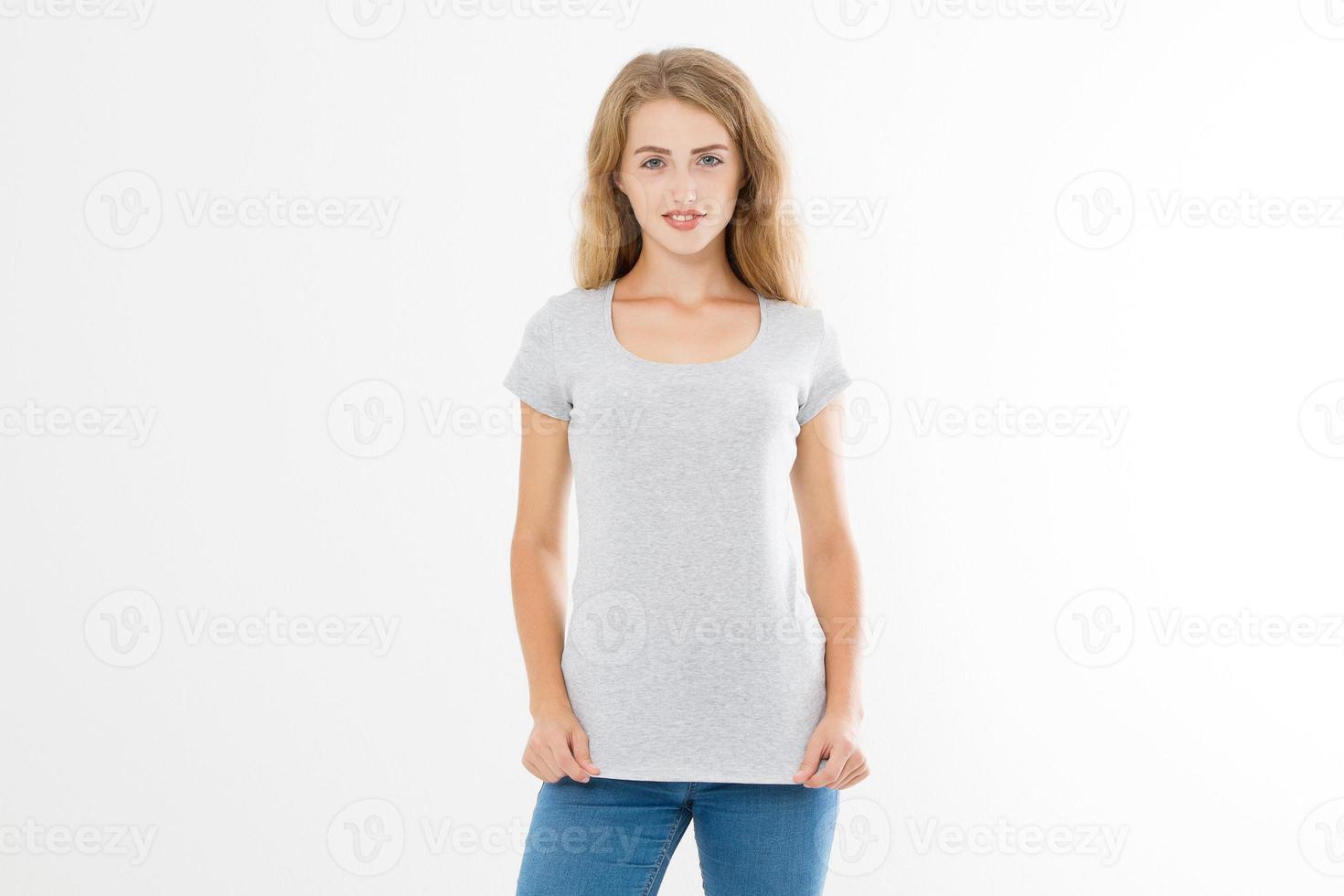Young blonde woman with fit slim body in blank template t shirt and jeans isolated on white background. Skin and hair care. Copy space and mock up photo