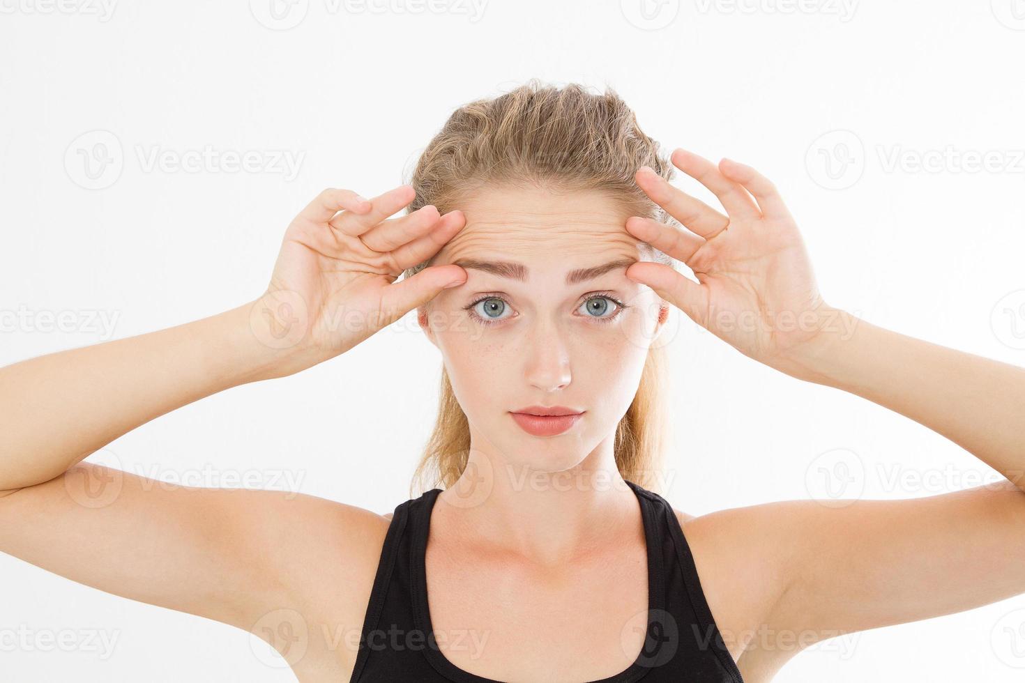 Macro wrinkles on woman forehead. Skin care concept. Copy space photo