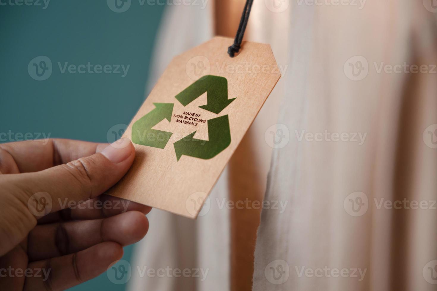 Recycling Products Concept. Organic Cotton Recycling Cloth. Zero Waste Materials. Environment Care, Reuse, Renewable for Sustainable Lifestyle. Recycle Icon show on Tag photo