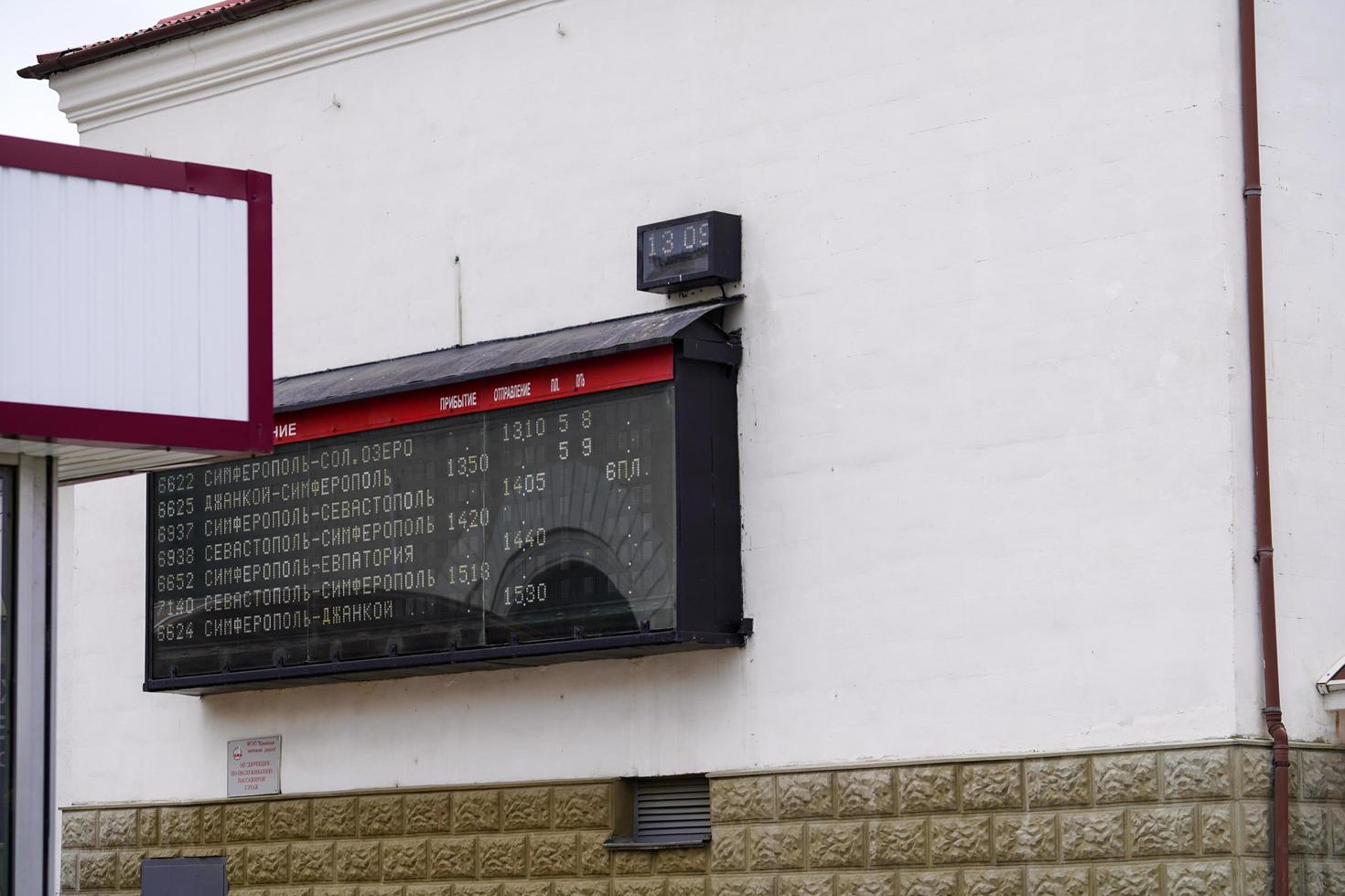 Simferopol, Crimea-June, 6, 2021 Information electronic scoreboard of Simferopol railway station photo