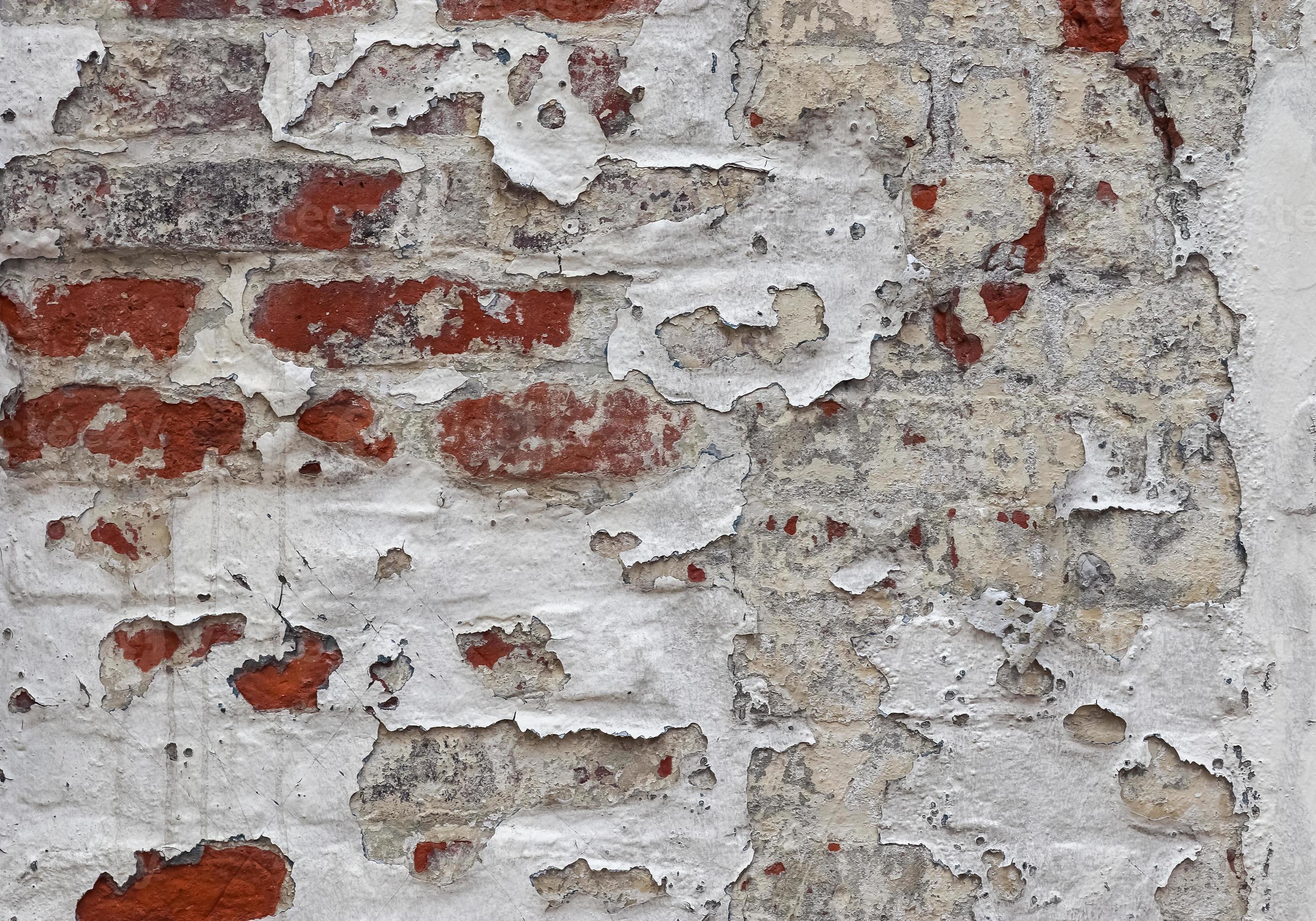 Old vintage weathered brick wall with peeling paint. 12830059 Stock
