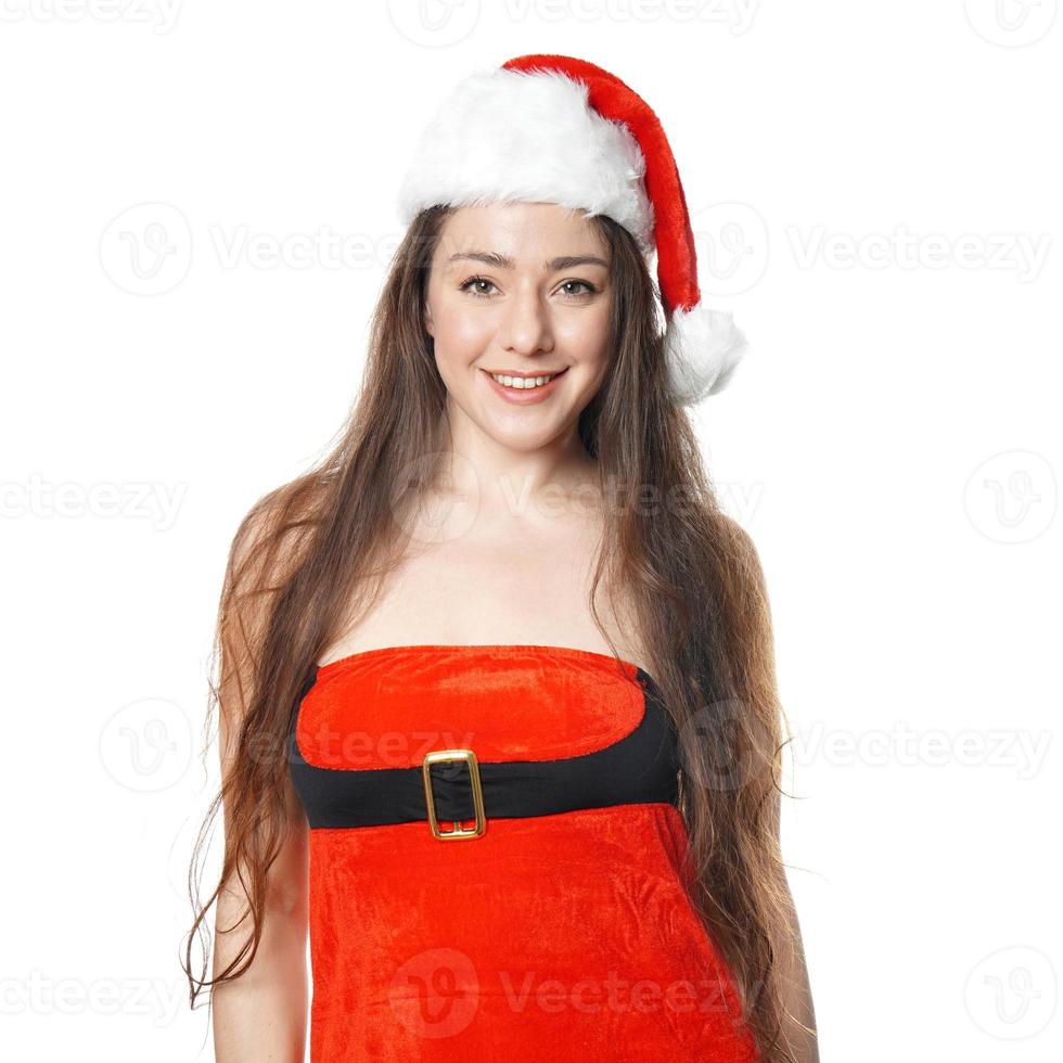 sonriente señorita santa vistiendo sexy traje de navidad foto