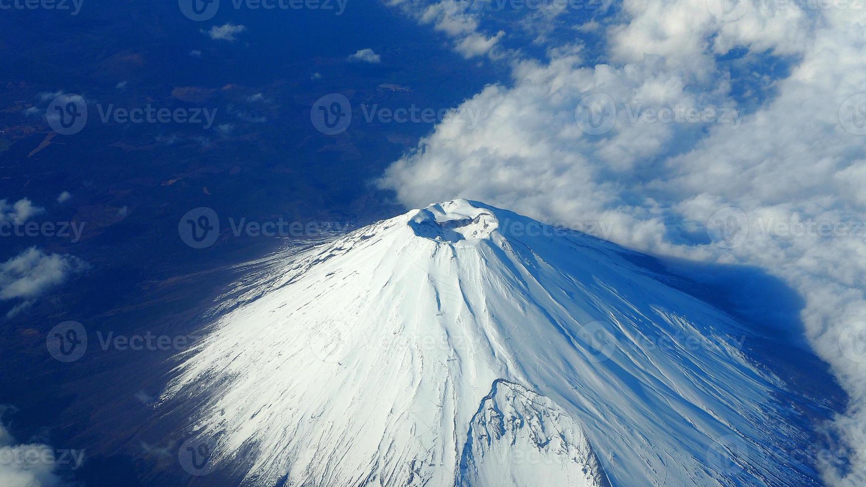 Top view angle of Mt. Fuji mountain and white snow photo