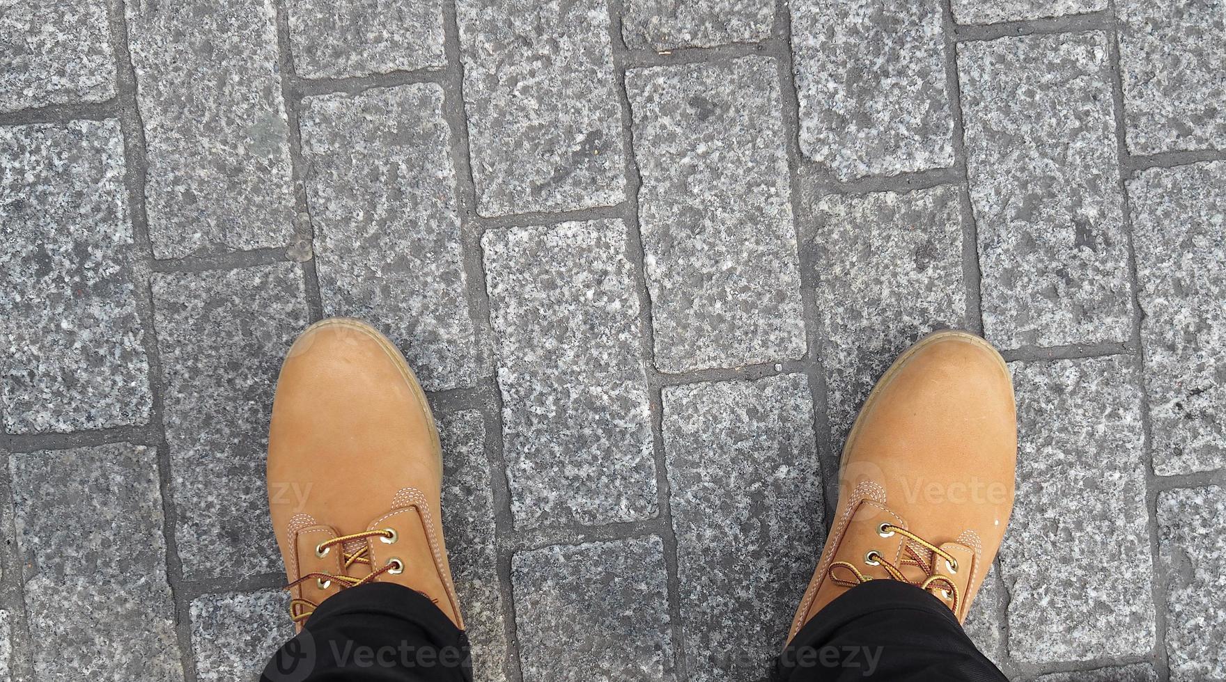 Man yellow boot shoe top view . photo