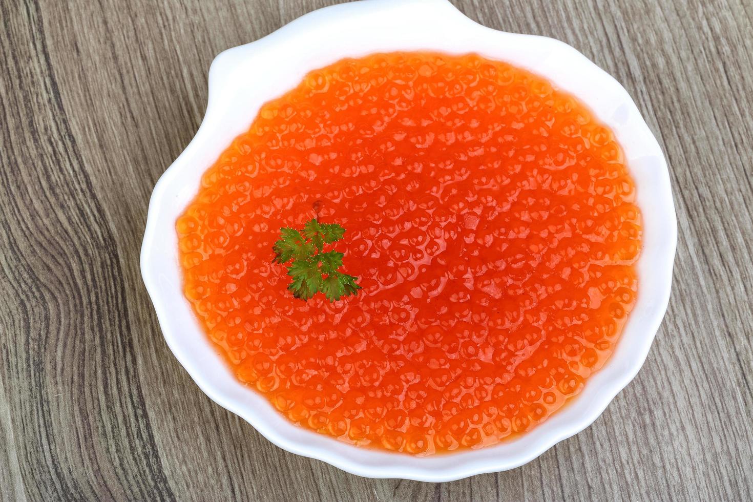 Red caviar dish view photo