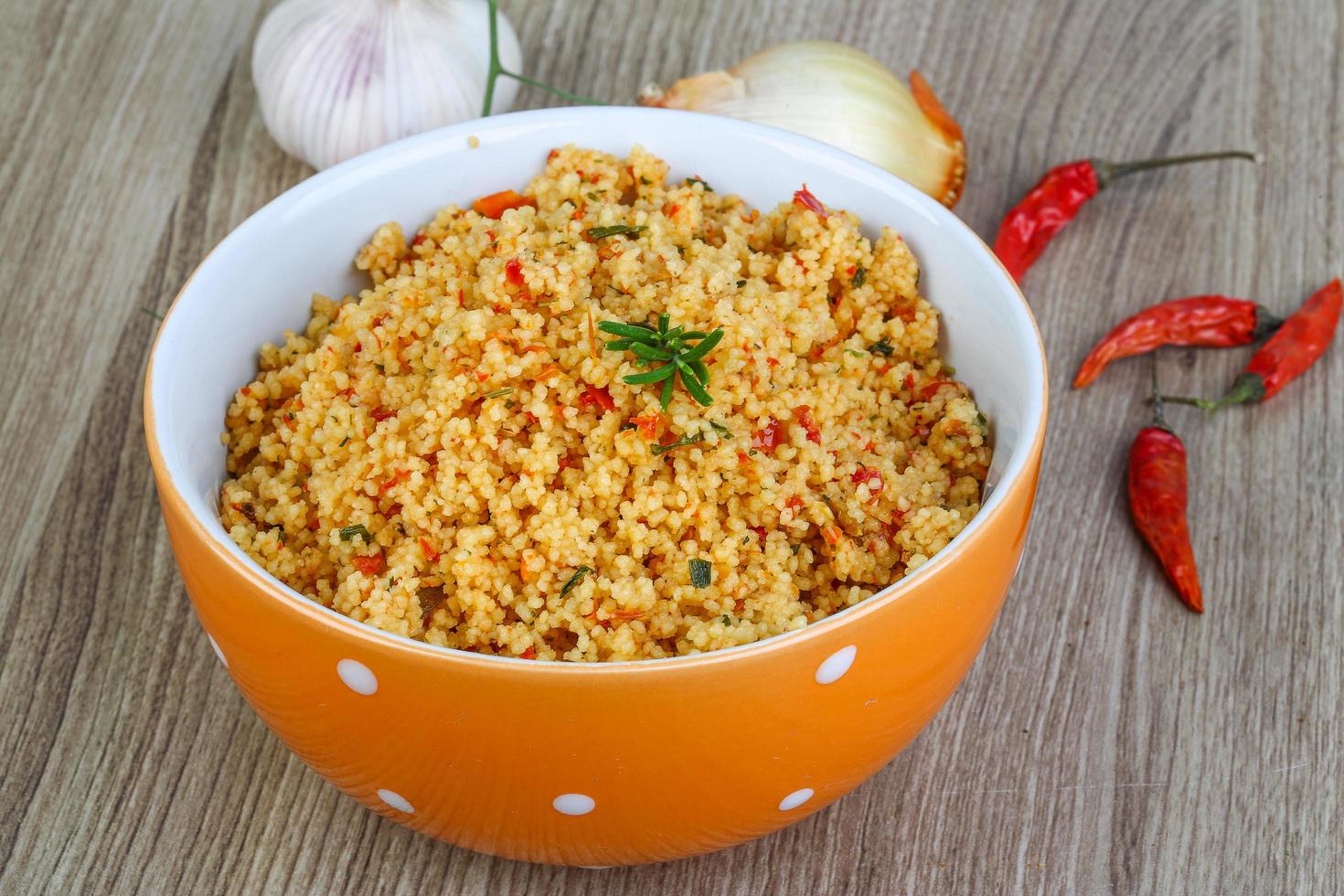Couscous on wood photo