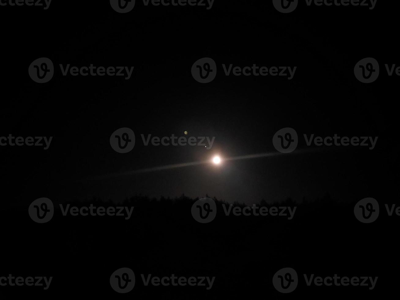 Night full moon in the village photo