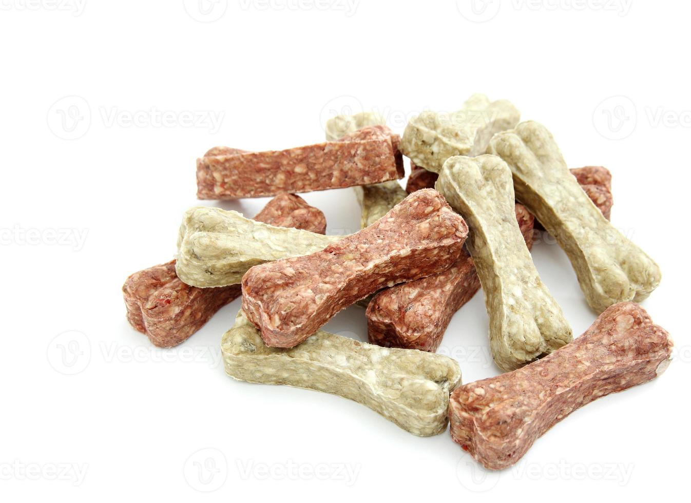 Dog bone food isolated on white photo
