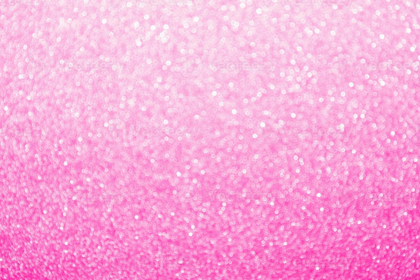Abstract blur pink glitter sparkle defocused bokeh light background photo