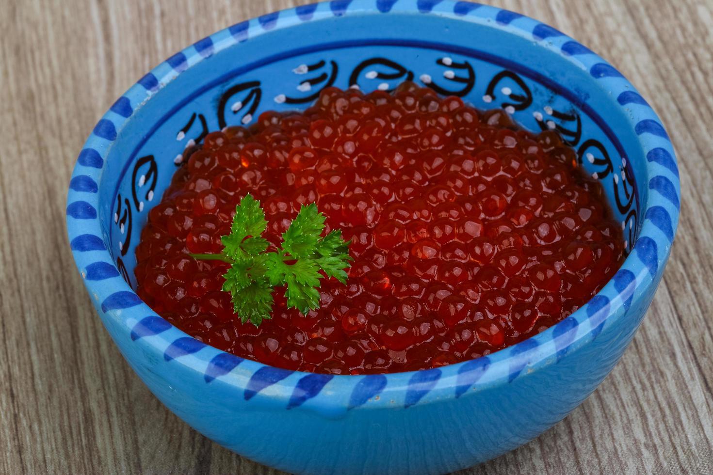 Red caviar dish view photo