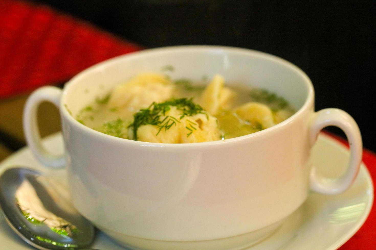Dumpling soup close up view photo