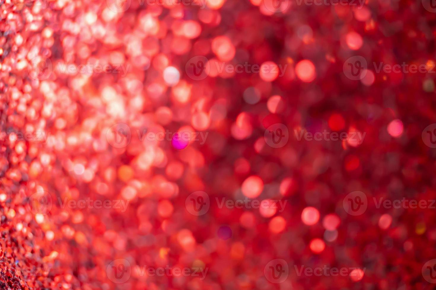 Abstract blur red glitter sparkle defocused bokeh light christmas background photo