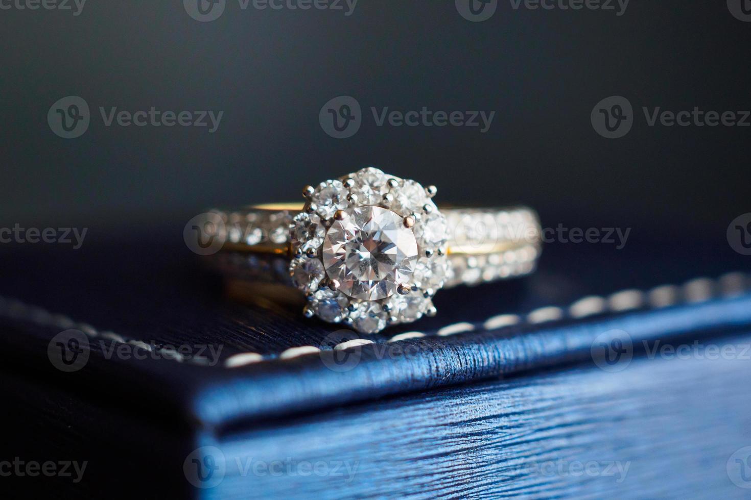 wedding gold diamond ring on jewelry box photo