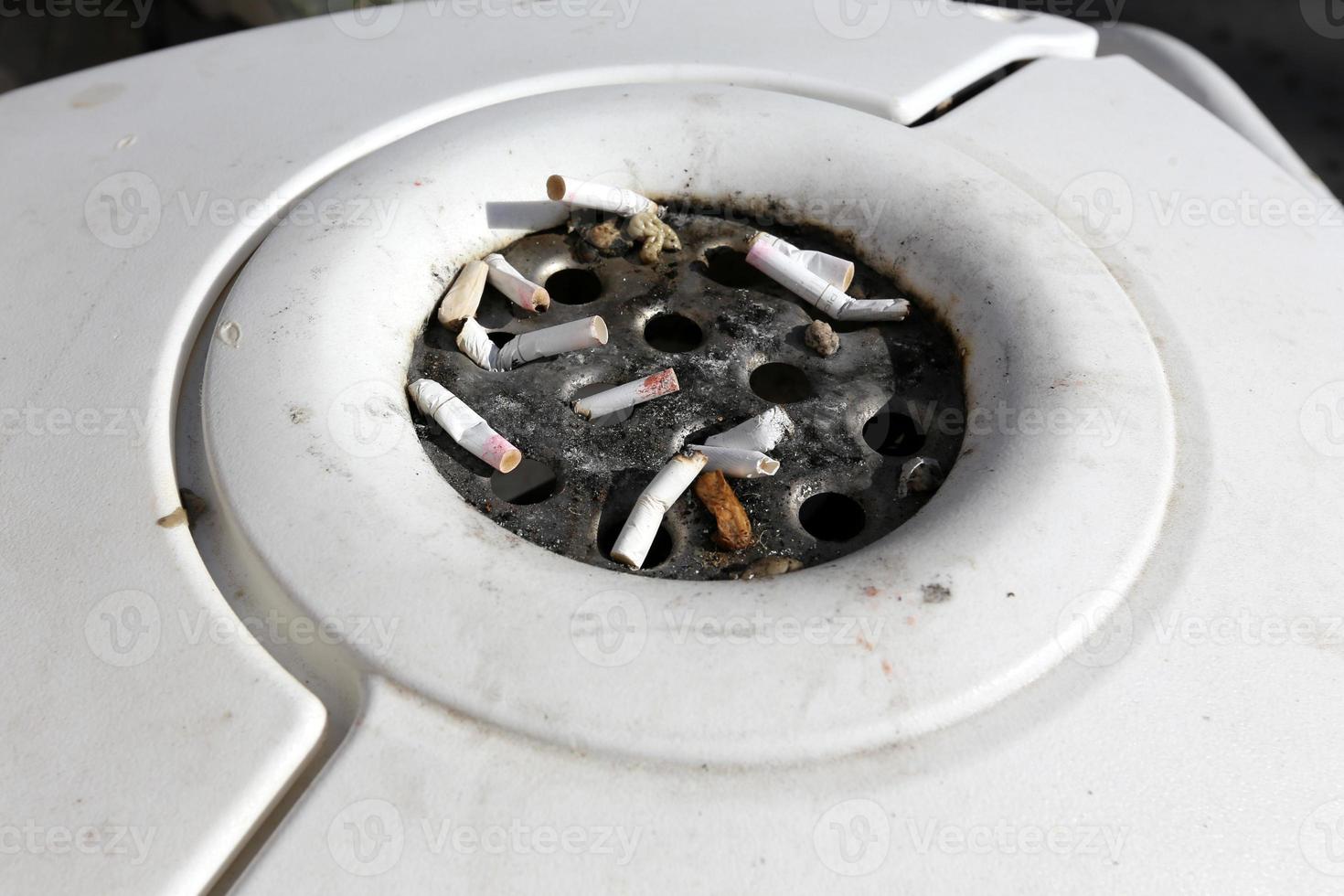 Ashtray for tobacco ash and used tobacco products. photo