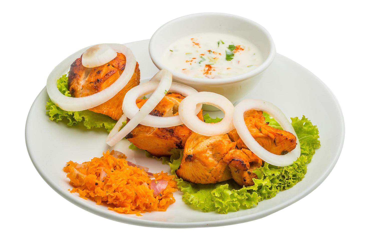 Chicken Tikka on white photo