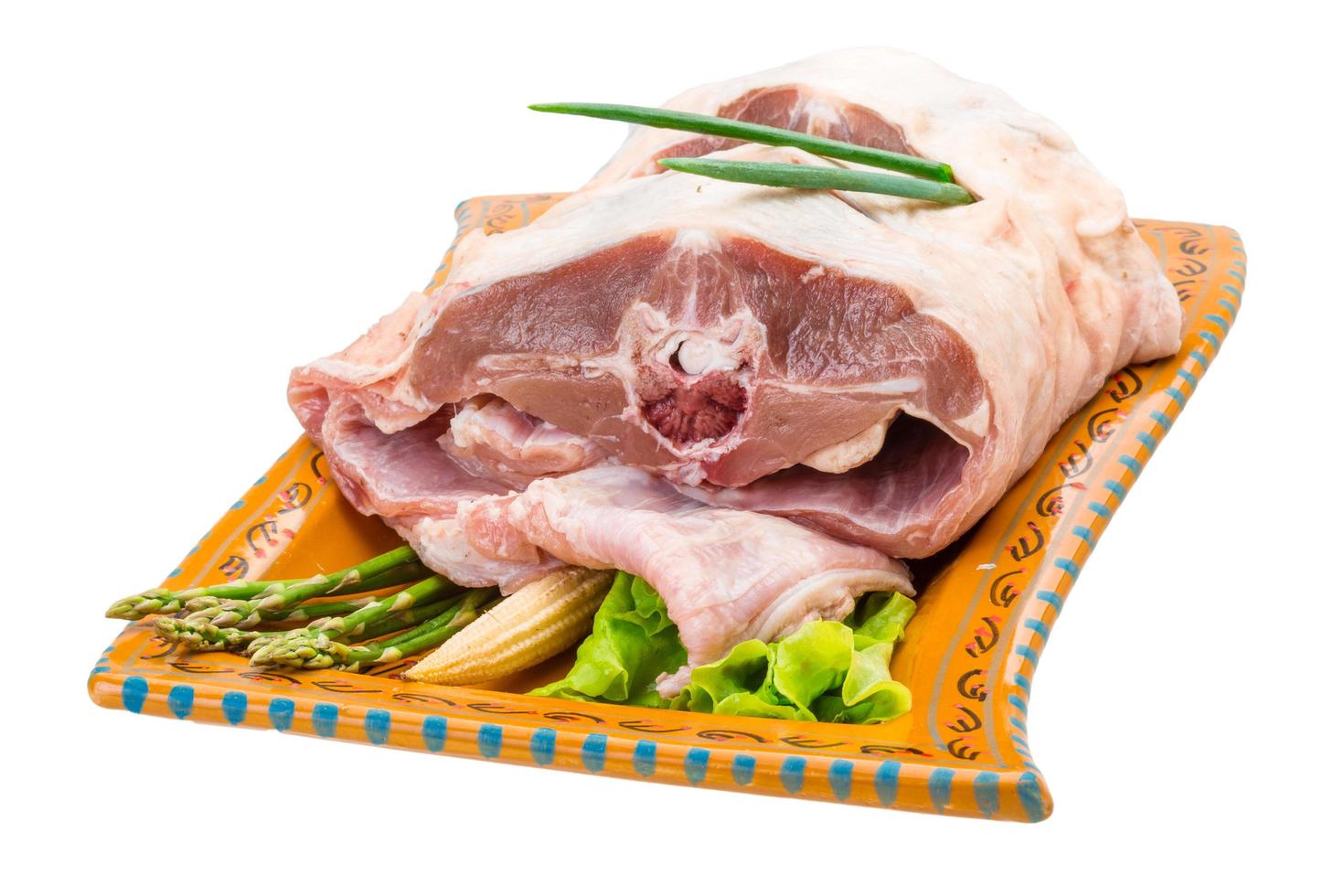 Raw lamb on white photo