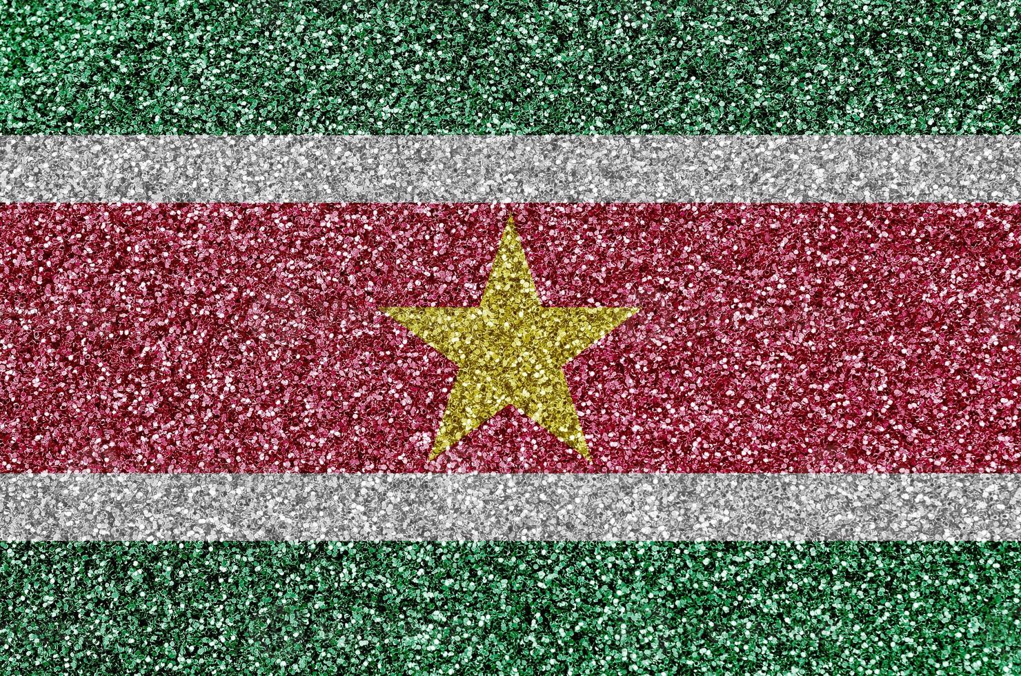 Suriname flag depicted on many small shiny sequins. Colorful festival background for party photo