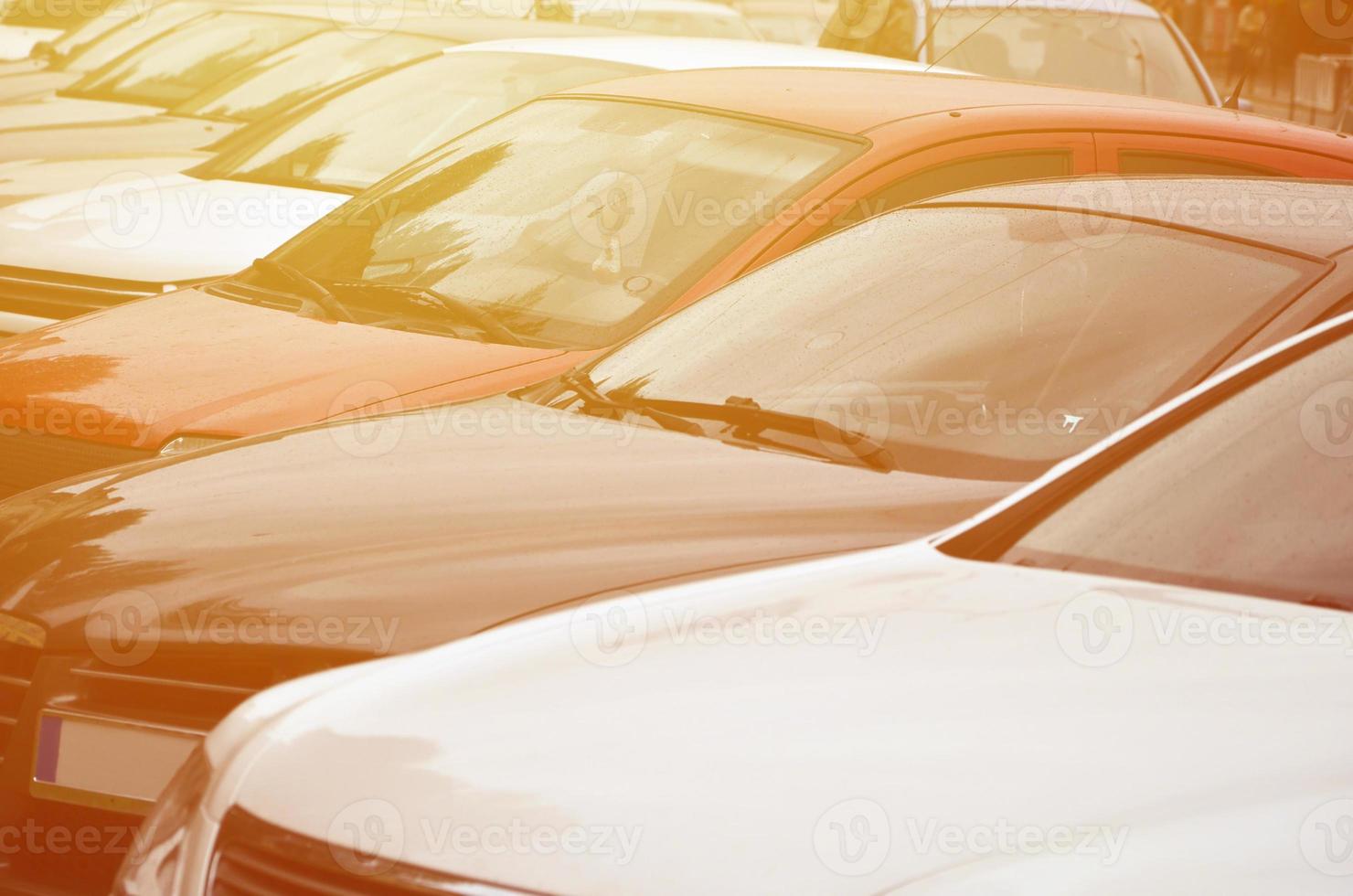 Roofs of several cars. A lot of cars stand close at rush hour photo