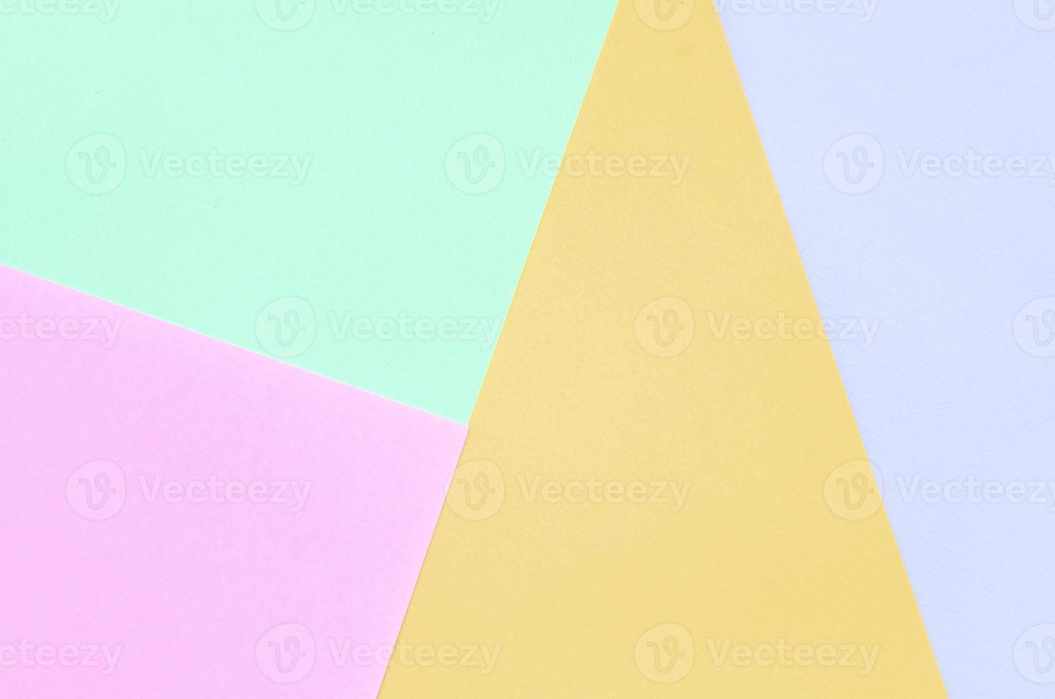 Texture background of fashion pastel colors. Pink, violet, orange and blue geometric pattern papers. photo