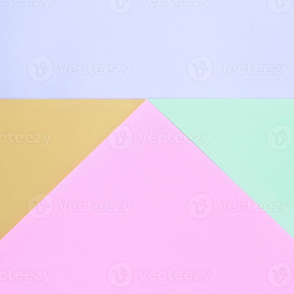 Texture background of fashion pastel colors. Pink, violet, orange and blue geometric pattern papers. photo