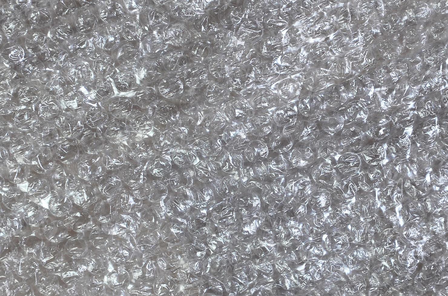 White bubble Wrap Packing Or Air Cushion material. Abstract Texture For Creative Art Work, Close Up dfckground, Top View with Copy Space photo