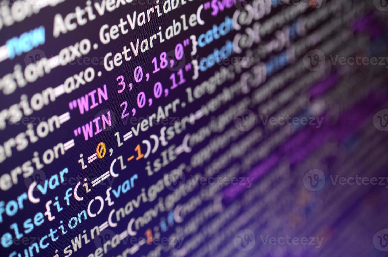 Macro shot of the command line on the monitor of the office computer. The concept of the programmer's work. Information line flow photo