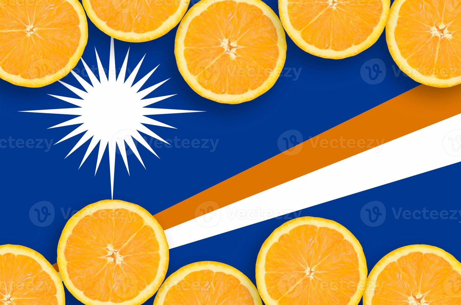 Marshall Islands flag  in citrus fruit slices horizontal frame photo