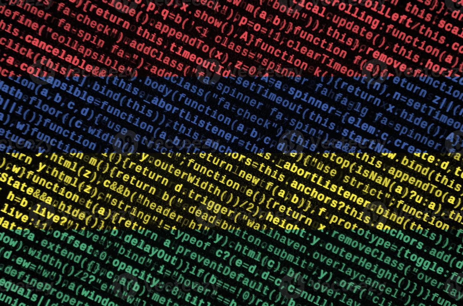 Mauritius flag  is depicted on the screen with the program code. The concept of modern technology and site development photo