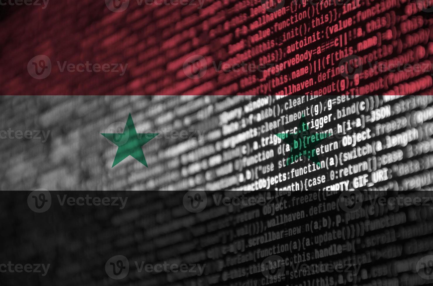 Syria flag  is depicted on the screen with the program code. The concept of modern technology and site development photo