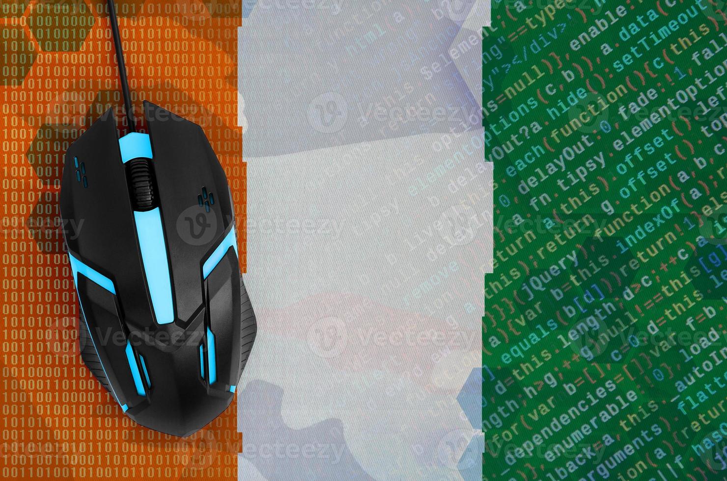 Ivory Coast flag  and computer mouse. Digital threat, illegal actions on the Internet photo