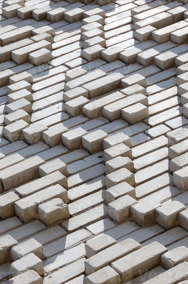 A pattern made of white bricks in the form of diamond shapes. Decoration of the walls during the Soviet Union photo