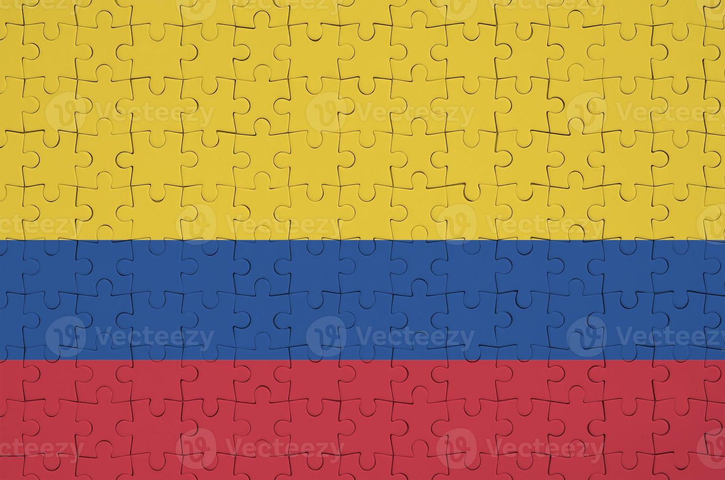 Colombia flag  is depicted on a folded puzzle photo