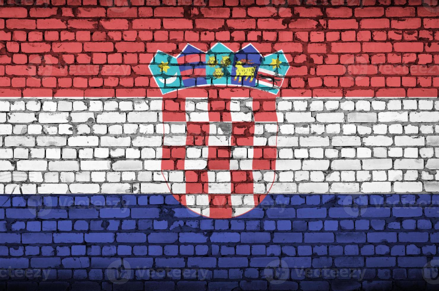 Croatia flag is painted onto an old brick wall photo