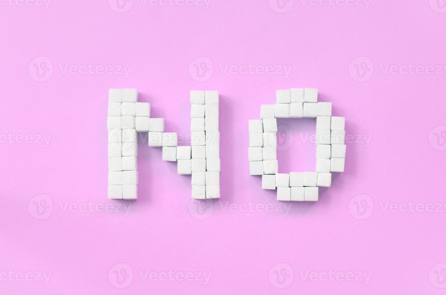 Refusing sugar sign with big letters on pink background photo