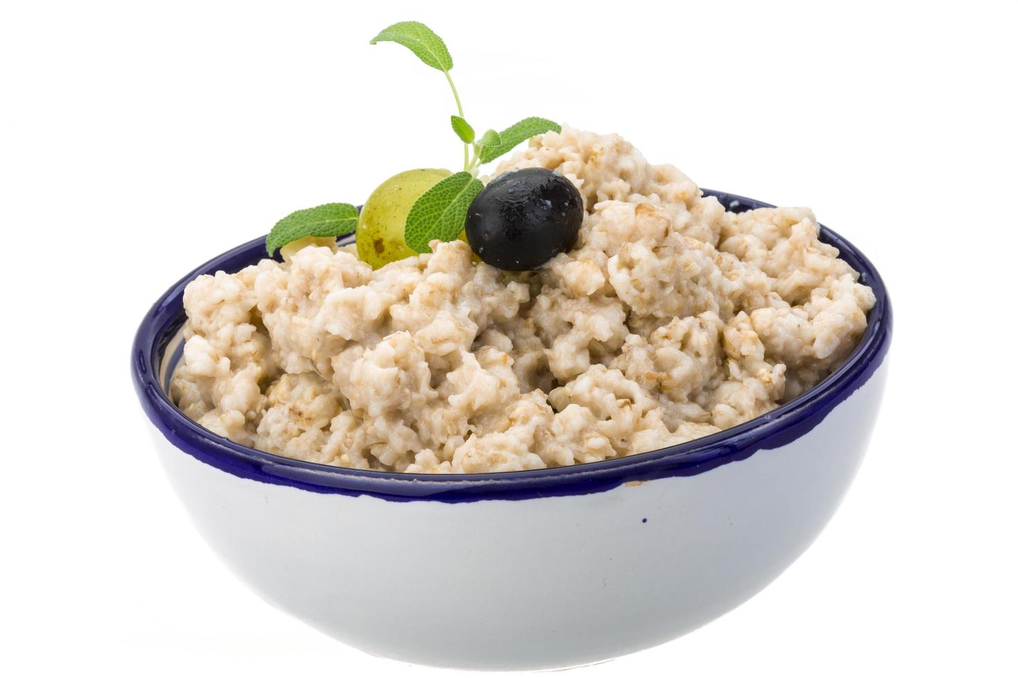 Oats porridge on white photo