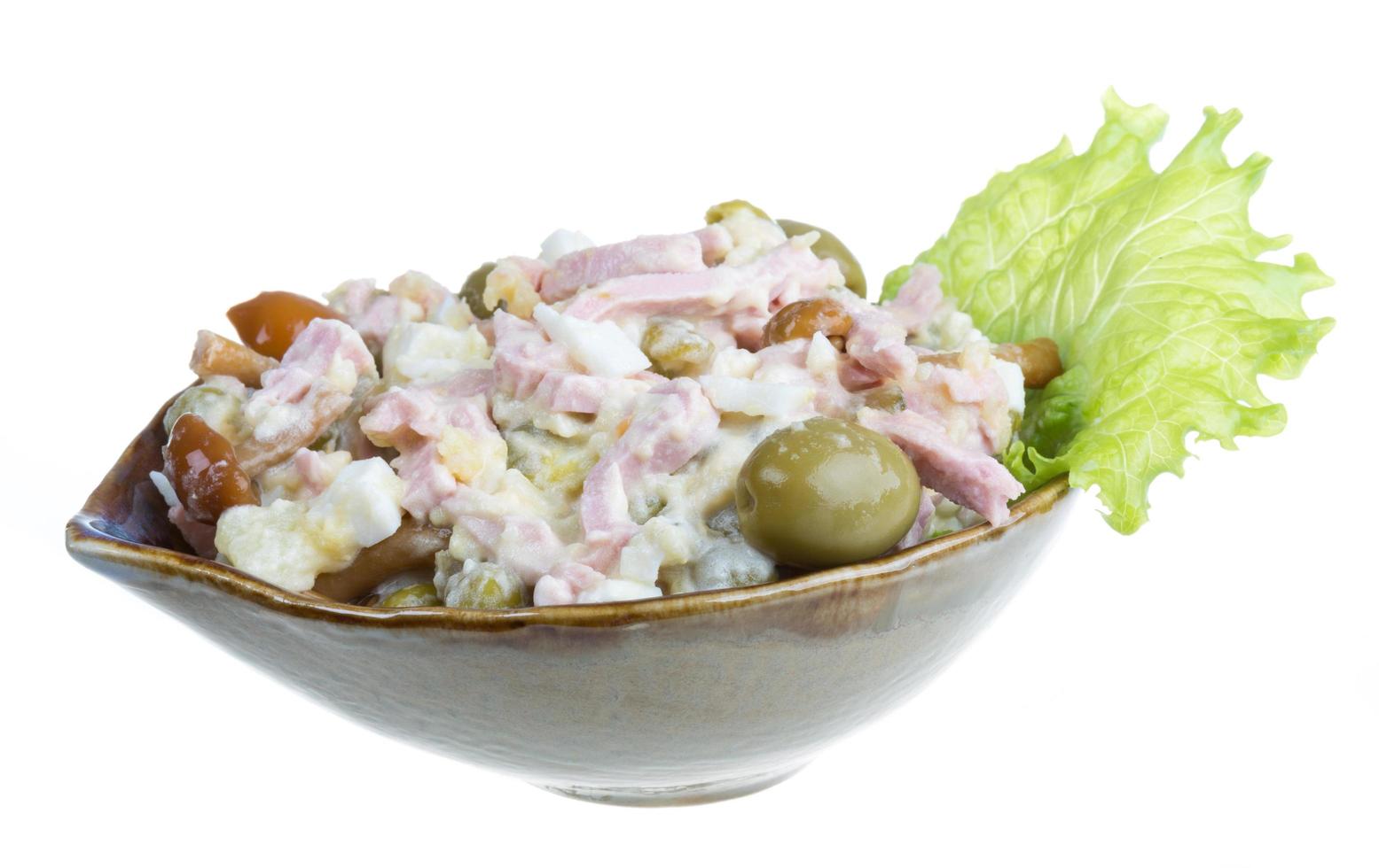 Russian salad on white photo
