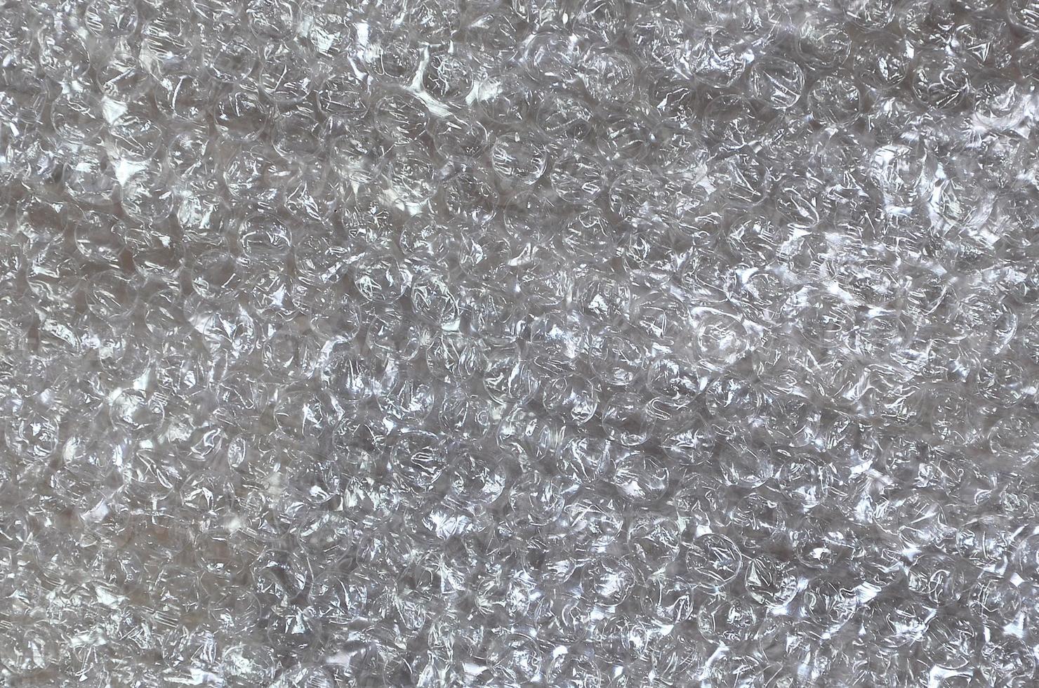 White bubble Wrap Packing Or Air Cushion material. Abstract Texture For Creative Art Work, Close Up dfckground, Top View with Copy Space photo