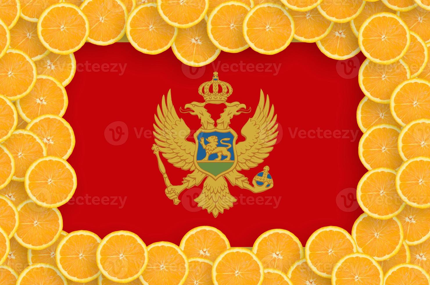 Montenegro flag  in fresh citrus fruit slices frame photo