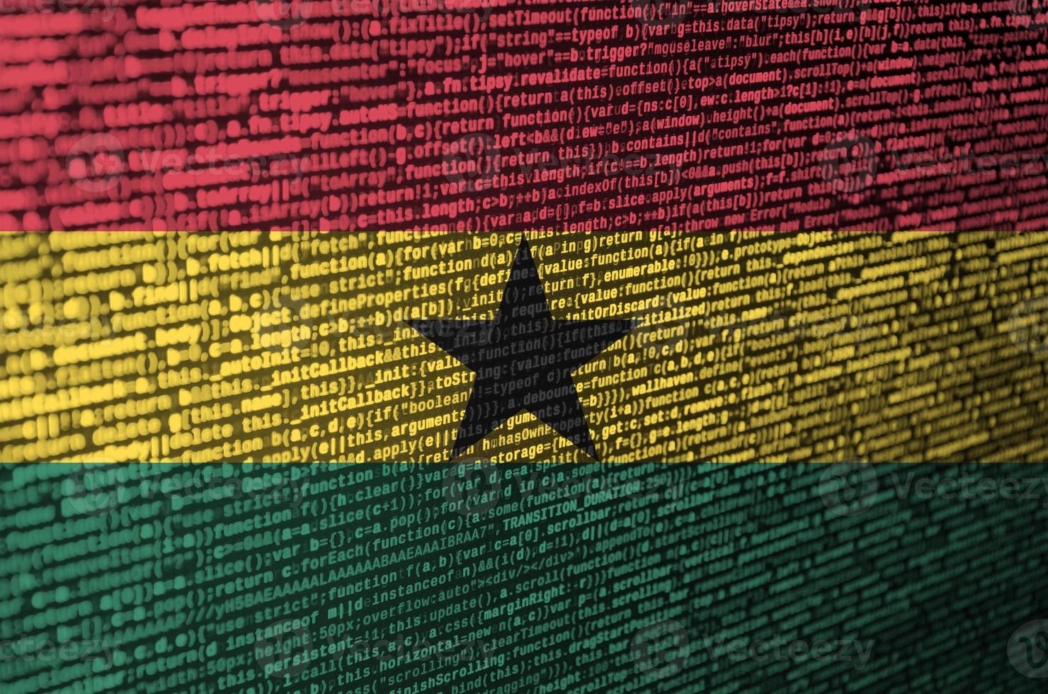 Ghana flag  is depicted on the screen with the program code. The concept of modern technology and site development photo